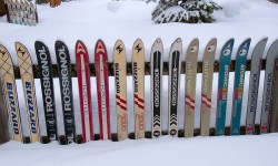 Sarreyer. Wooden Alpine chalet. Old skis. Snow.